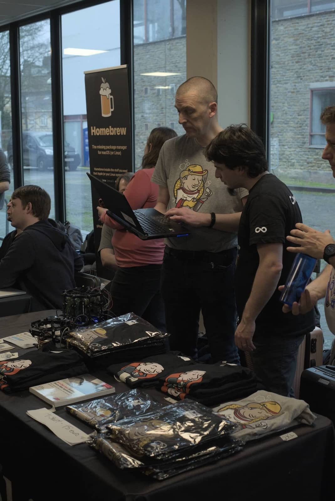 Damien Duportal and Bruno Verachten at the Jenkins booth during FOSDEM.